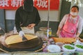 Steet vendors making pancekes, Beijing, China