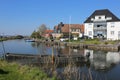 Beautiful homes and old wooden boat near the Pie