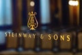 Steinway & Sons logo on black pianoforte