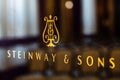 Steinway & Sons logo on black pianoforte