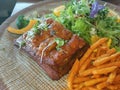 Stek and salad at the resturant in Chiangmai,north of Thailand. Royalty Free Stock Photo