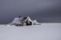 Old traditional Icelandic fishermans cottage during wintertime.