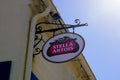 Stella Artois beer belgium brewery restaurant sign text and brand logo on wall facade Royalty Free Stock Photo