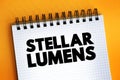 Stellar Lumens text on notepad, concept background