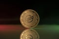 Stellar Lumens XLM crypto coin placed on reflective surface in dark background