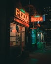 Stellas Pizza neon signs at night, Manhattan, New York