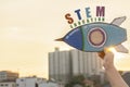 STEM Education concept. Kids are holding a rocket paper,STEM tex Royalty Free Stock Photo