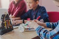 Stem education. Kids creating robots at school Royalty Free Stock Photo