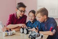 Stem education. Kids creating robots at school