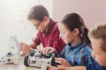 Stem education. Kids creating robots at school Royalty Free Stock Photo