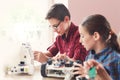 Stem education. Kids creating robots at school Royalty Free Stock Photo