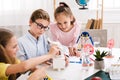 Stem education. Kids creating robots at school Royalty Free Stock Photo