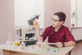 Stem education. Teenage boy make chemical research