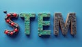 STEM letters represent science, tech, engineering, math. S shows atom model. T has circuits. M displays math formulas and physics Royalty Free Stock Photo