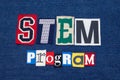 STEM PROGRAM text word collage, colorful fabric on blue denim, science technology engineering and mathematics Royalty Free Stock Photo