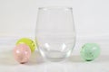 Stemless wineglass mockup with colorful Easter eggs