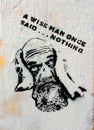 Street wall art stencil of a wise bearded old man