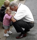 Steny Hoyer meets a little child in Greenbelt at a parade