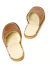 Step be step - Pair of men's house slippers Royalty Free Stock Photo