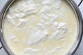 Step cooking cottage cheese, sourdough milk in a saucepan