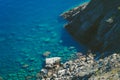 Captivating tropical serenity blue beach beauty embraced by rugged rocks in a stunning stock photo