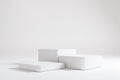 3 step of empty white cube podium on white background