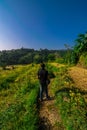 Traveler in Step Farming in Mountains