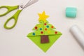 Step-by-step instructions for making Christmas Tree Corner Bookmarks. DIY. Creative origami ideas for kids. Top view