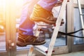 Step Ladder Safety. Climbing Man Royalty Free Stock Photo