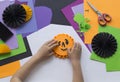 Step by step master class. Create a decoration for a party from Halloween pumpkins. Royalty Free Stock Photo