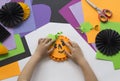 Step by step master class. Create a decoration for a party from Halloween pumpkins. Royalty Free Stock Photo