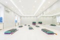 Step platform in a large, light, empty aerobics room. Active lifestyle and sports