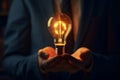 Illuminate Innovation: Businessman Holding a Glowing Lamp (AI Generated)