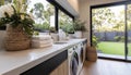 Step into a realm of pristine efficiency and refined style with this meticulously designed laundry area, where the stark elegance Royalty Free Stock Photo