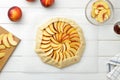 Step by step recipe galette or pie with nectarines. Dough with stuffing ready to bake.