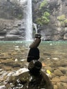 Balanced Rocks by the Serene Waterfall Royalty Free Stock Photo