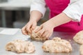 Step-by-step Easter cake, pastry chef prepares dough with raisins for festive kulich Royalty Free Stock Photo