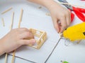 Step-by-step instructions for creating a house from bamboo sticks. children`s creativity, manual work, online classes. step 5. usi