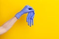 Step-by-step instructions on how to remove dirty gloves, doctor take off from hand glove Royalty Free Stock Photo