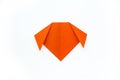 Step-by-step origami instructions. How to make a dog out of orange colored paper. Instructions on a white background top Royalty Free Stock Photo