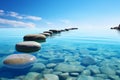 Step stones create a serene pathway in the calm blue water, embodying Zen