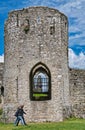 In step walkers pace the grounds of St Johns Trim castle Co Meath  Ireland Royalty Free Stock Photo