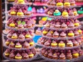 Set of Cupcakes in a Bakery Store Behind Glass Vitrine - Generative AI