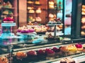 Set of Cupcakes in a Bakery Store Behind Glass Vitrine - Generative AI