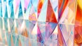 Step into a world of geometric illusions with this stunning backdrop of mirrored triangular prisms perfect for