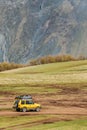 Land Rover Discovery Suv Car On Off Road In Spring Mountains Landscape In Georgia. Mid-size Luxury Suv, From The British Royalty Free Stock Photo