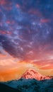 Georgia. Mount Kazbek Covered Snow In Winter Sunrise. Morning Dawn Colored Top Of Mountain In Pink-orange Colors Royalty Free Stock Photo