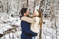 stepfather and daughter on forest in winter season