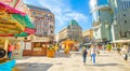 Stephansplatz square and walking people on street in Vienna city centre, Austria