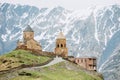 Stephantsminda, Georgia. Gergeti Trinity Church Or Tsminda Sameba - Holy Trinity Church Near Village Of Gergeti In